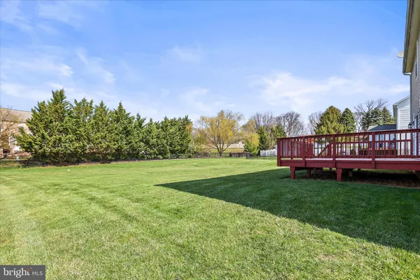 a view of backyard with deck