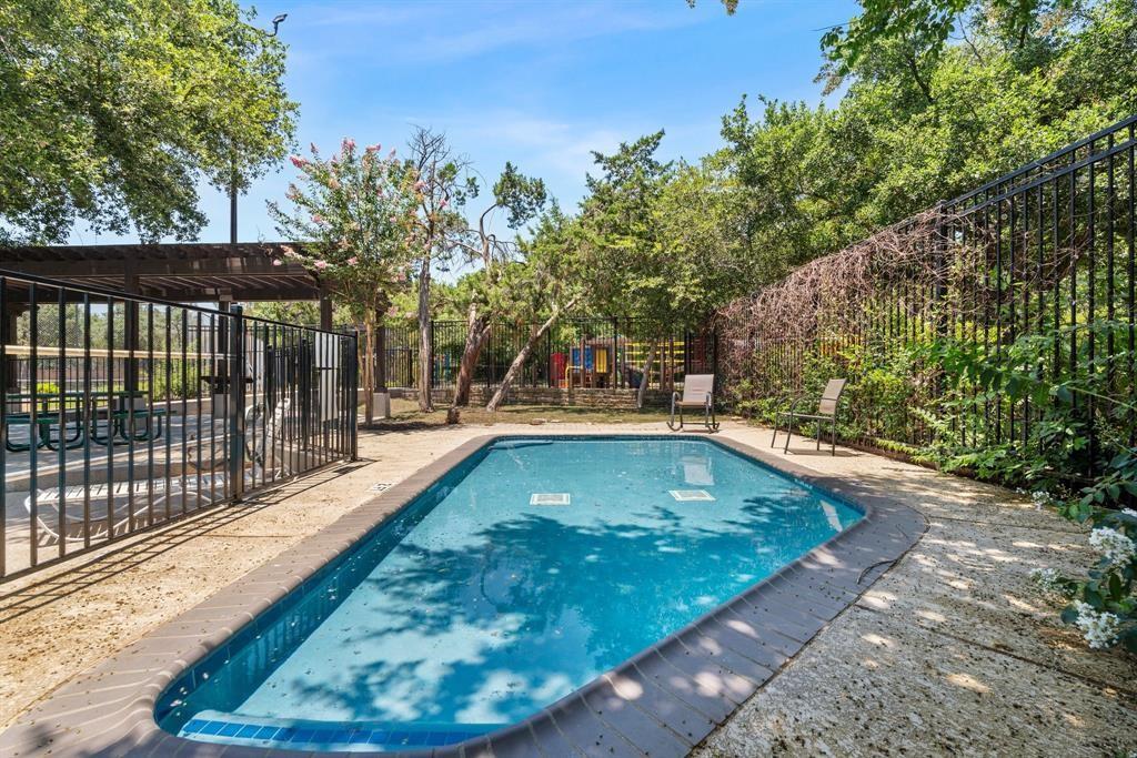1809 Springwater Drive Round Rock, TX 78681 - Photo 24 of 25 View of pool featuring patio surround and a pergola