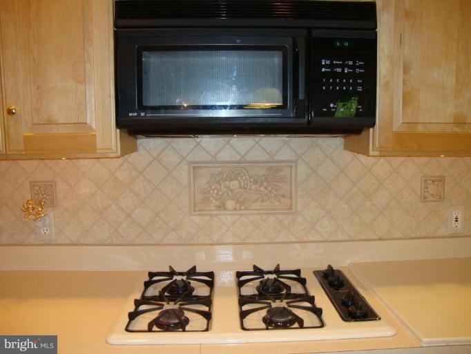 322 Felton Road Lutherville-Timonium, MD 21093 - Photo 10 of 30 gas cooktop and microwave