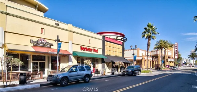 a view of street with shops