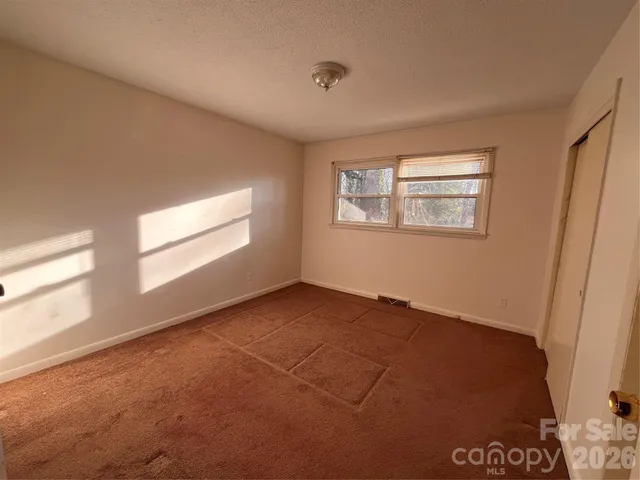 an empty room with a workbench