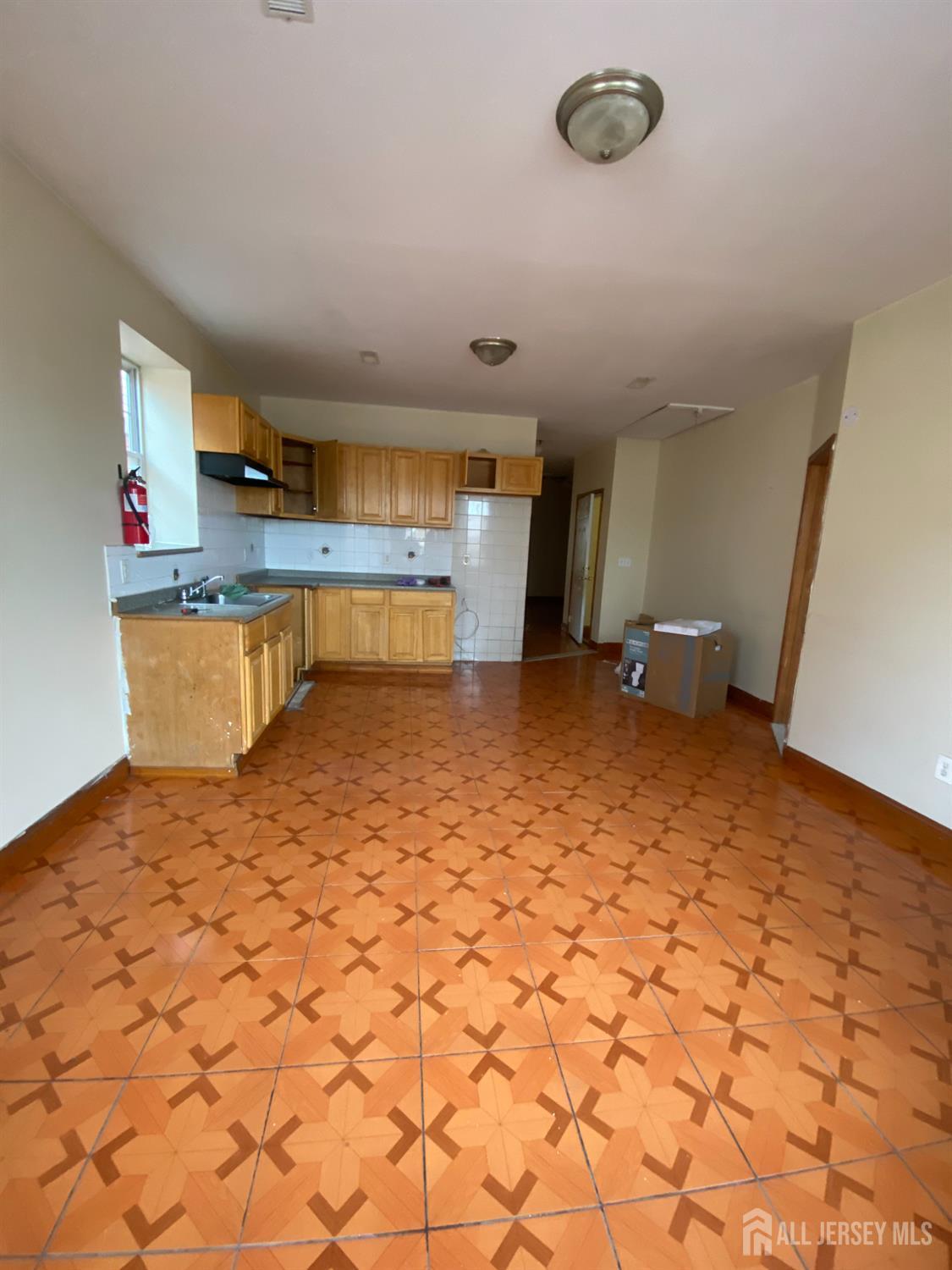 98 Catalpa Avenue, Unit 2 Perth Amboy, NJ 08861 - Photo 2 of 7 a room with storage and utility