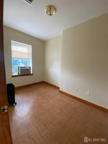 a view of a livingroom with a workspace