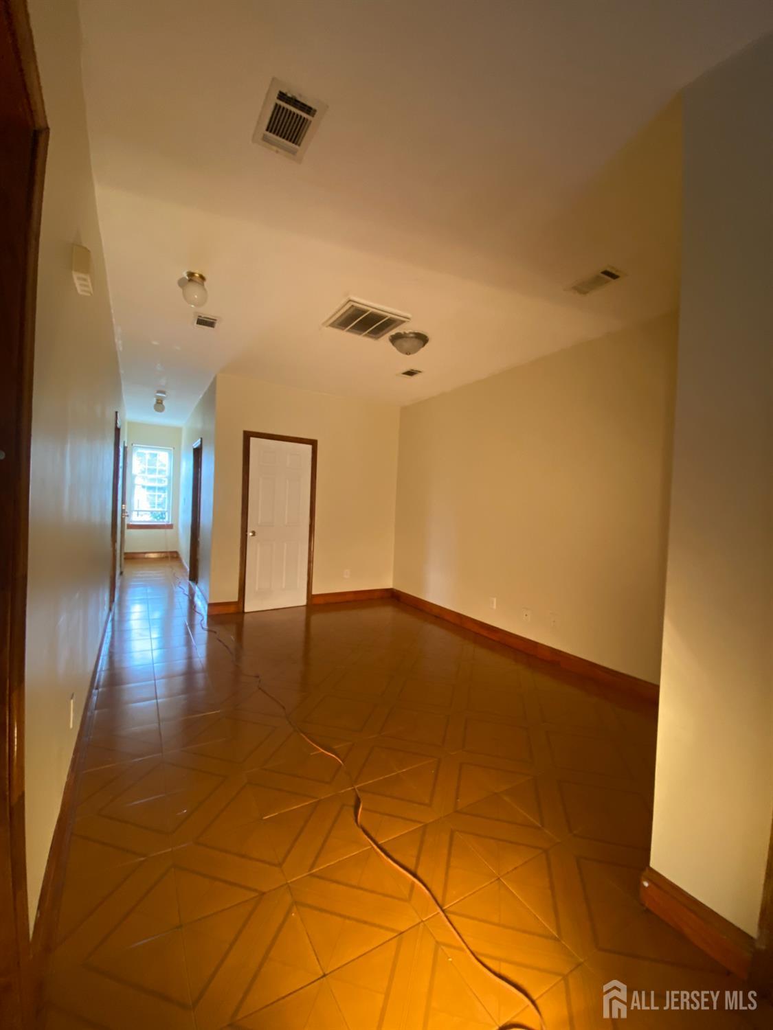 98 Catalpa Avenue, Unit 2 Perth Amboy, NJ 08861 - Photo 5 of 7 a view of an empty room