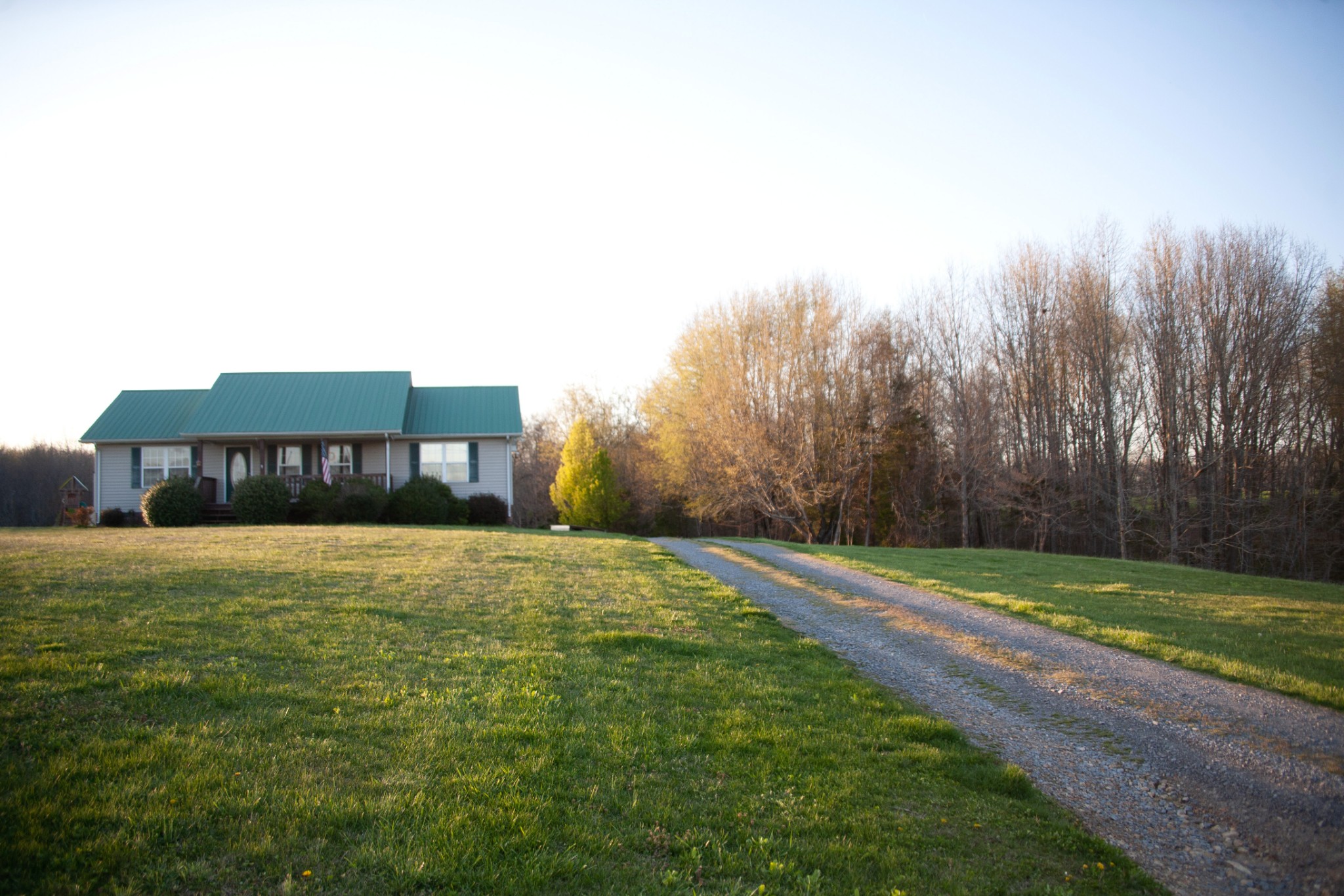 2122 Carthage Road Red Boiling Springs, TN 37150 - Photo 1 of 22 a big yard with large trees