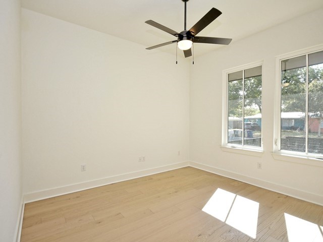 7500 St Cecelia Street Austin, TX 78757 - Photo 18 of 31 an empty room with a window