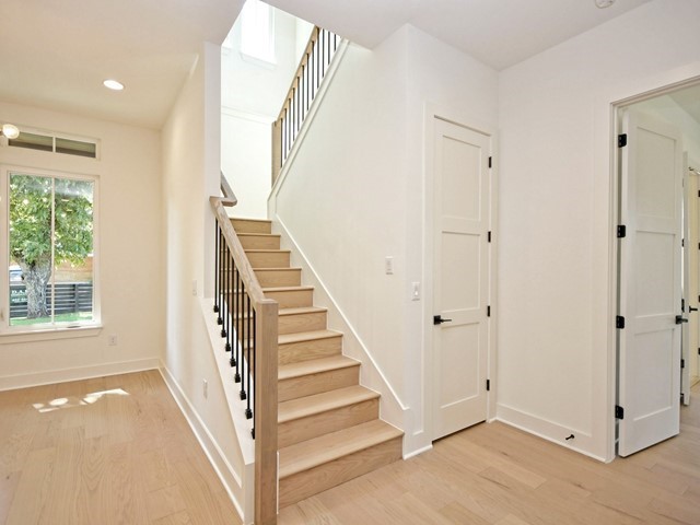 7500 St Cecelia Street Austin, TX 78757 - Photo 20 of 31 a view of a hallway with windows and entryway