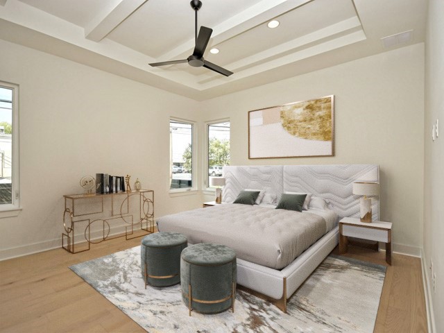 7500 St Cecelia Street Austin, TX 78757 - Photo 8 of 31 a bedroom with a bed and ceiling fan
