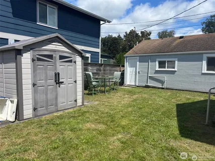 a view of a back yard of the house