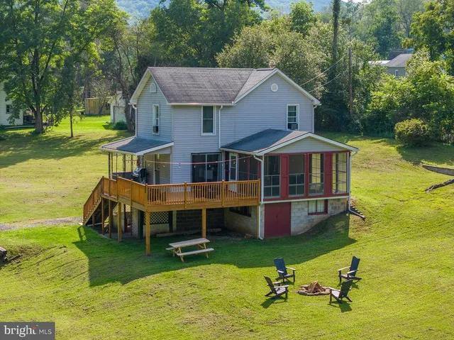 a view of a lake view with a large trees