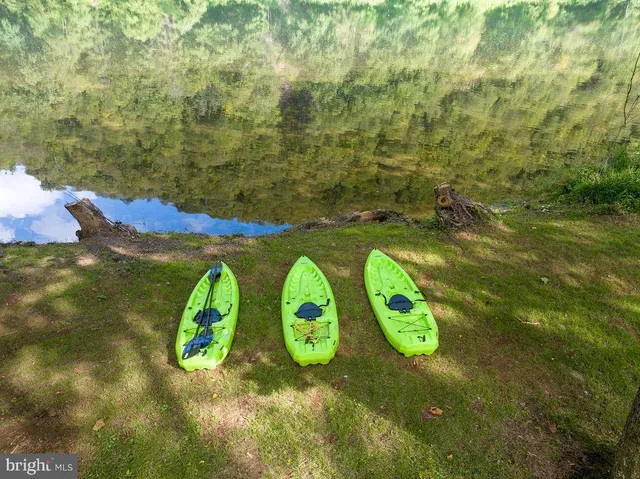 a aerial view of a house with a swimming pool