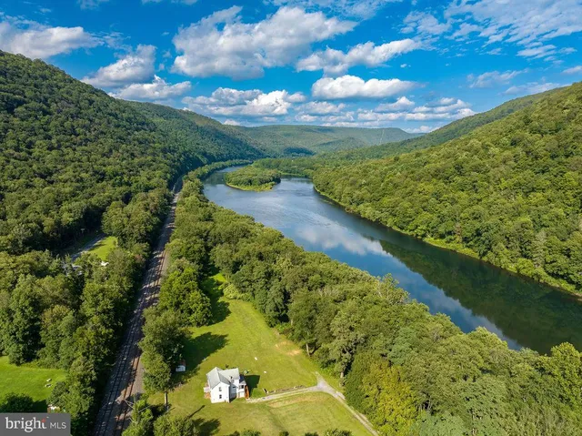 a view of a lake from a yard