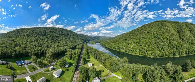 a bedroom with a bed and a chair