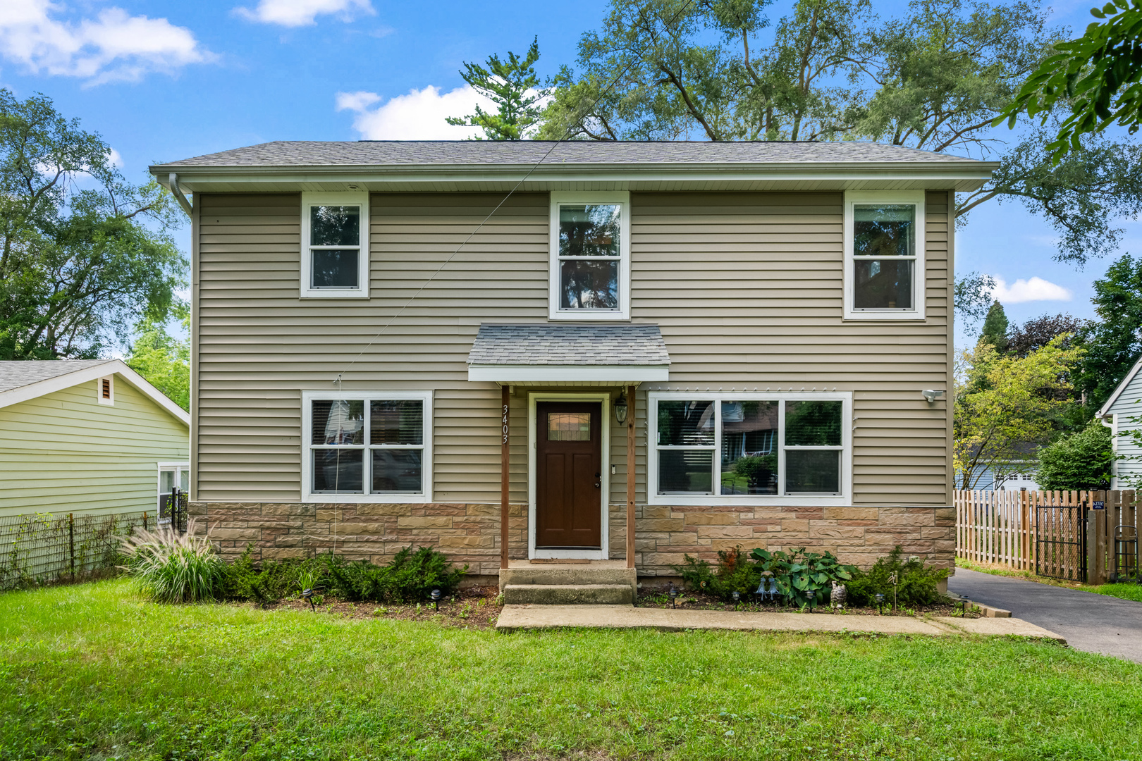 3403 Ridge Road Island Lake, IL 60042 - Photo 1 of 16 a front view of a house with a yard