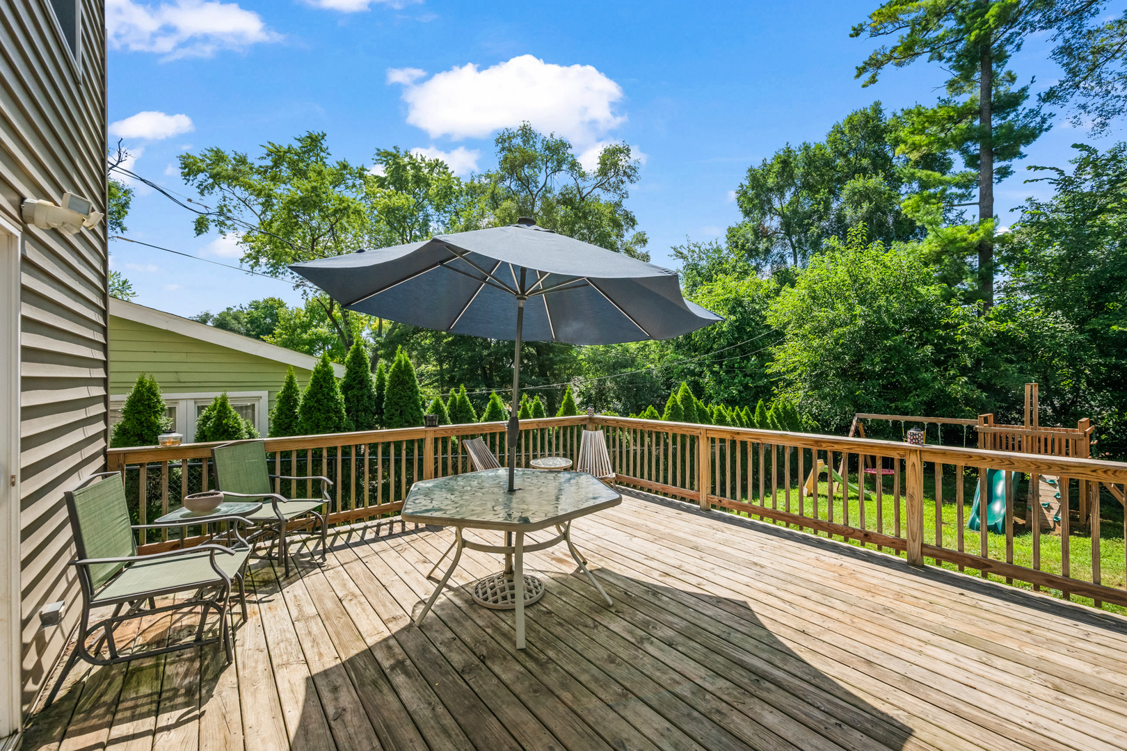 3403 Ridge Road Island Lake, IL 60042 - Photo 15 of 16 a view of balcony with wooden floor and outdoor seating