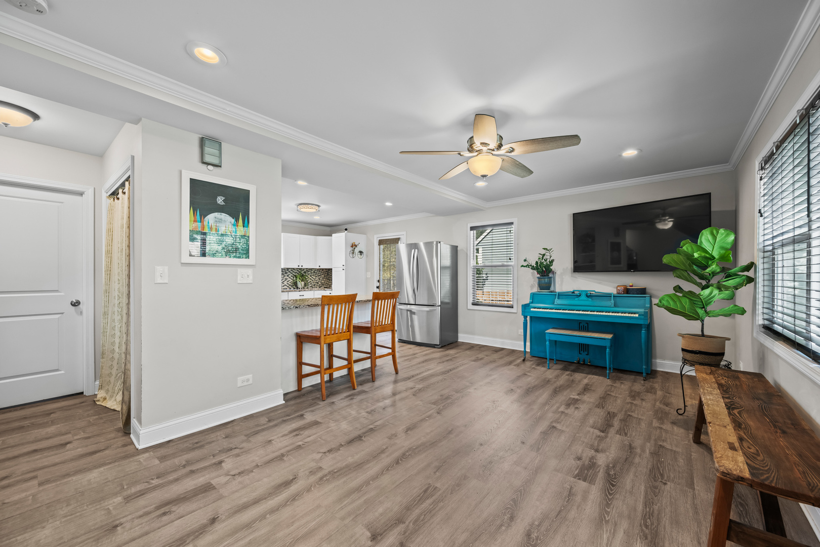 3403 Ridge Road Island Lake, IL 60042 - Photo 3 of 16 a living room with furniture and a flat screen tv