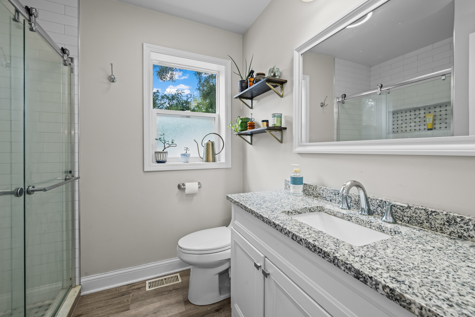 3403 Ridge Road Island Lake, IL 60042 - Photo 8 of 16 a bathroom with a granite countertop sink mirror vanity and toilet