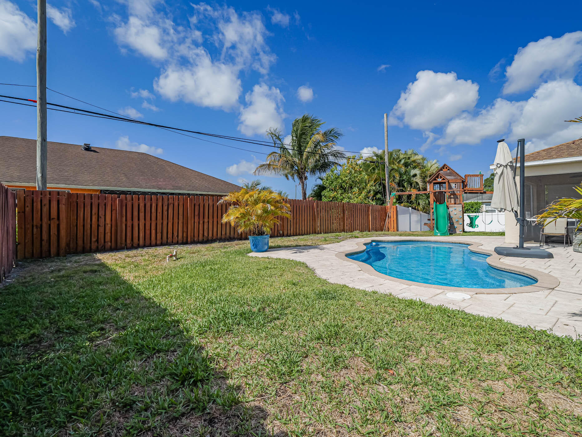 696 Southwest Jada Road Port St. Lucie, FL 34953 - Photo 32 of 38 Fenced Yard