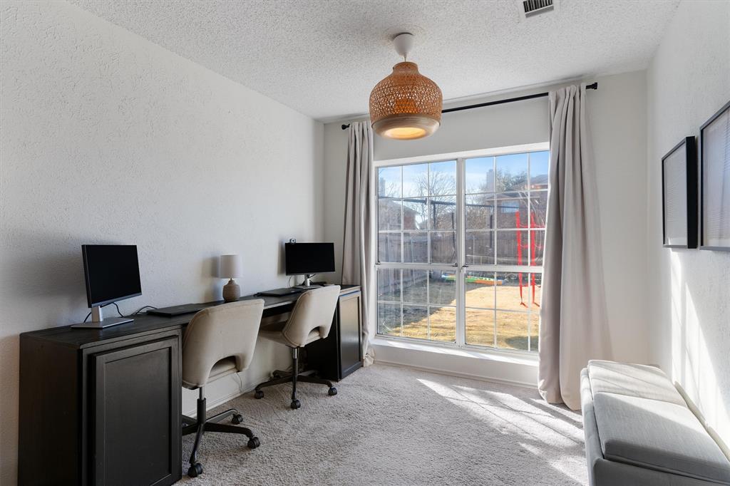 7518 Bayview Drive Rowlett, TX 75088 - Photo 14 of 22 Office space with carpet flooring, a textured ceiling, and a textured wall