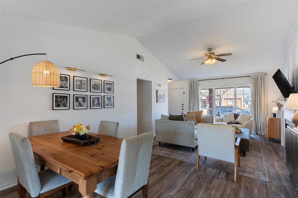 7518 Bayview Drive Rowlett, TX 75088 - Photo 6 of 22 Dining space with dark wood-style floors, lofted ceiling, and ceiling fan
