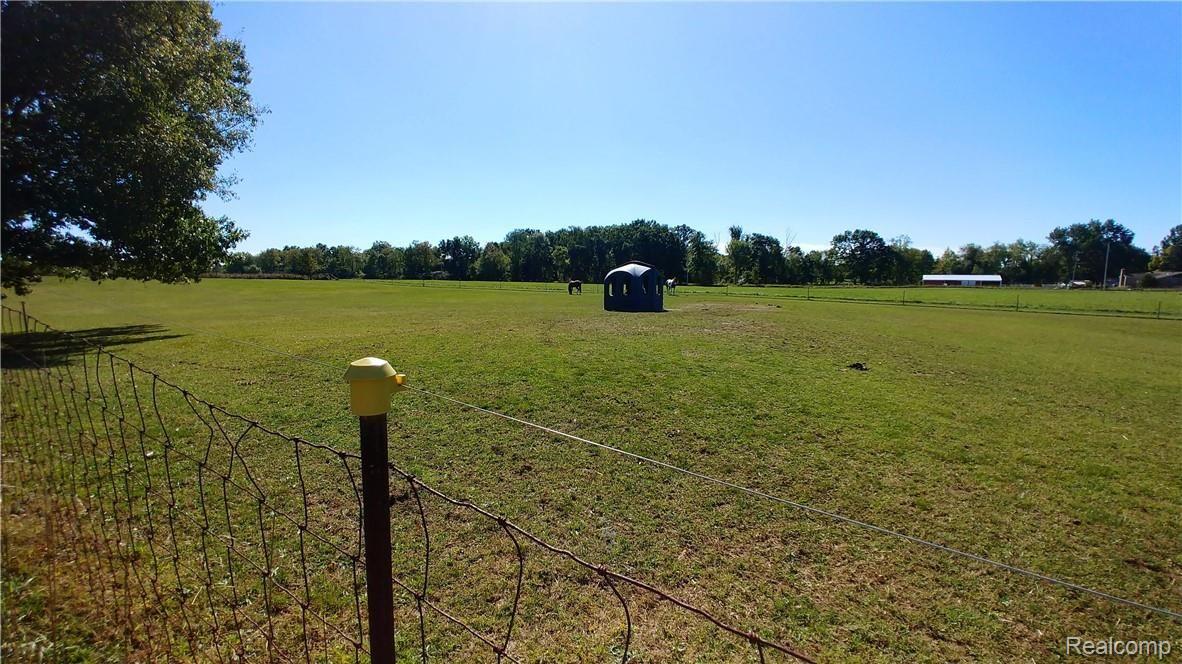 16075 Arnold Road Gregory, MI 48137 - Photo 43 of 54 Rear pasture with hay hut.jpg