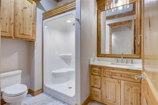 a view of an empty room with glass door