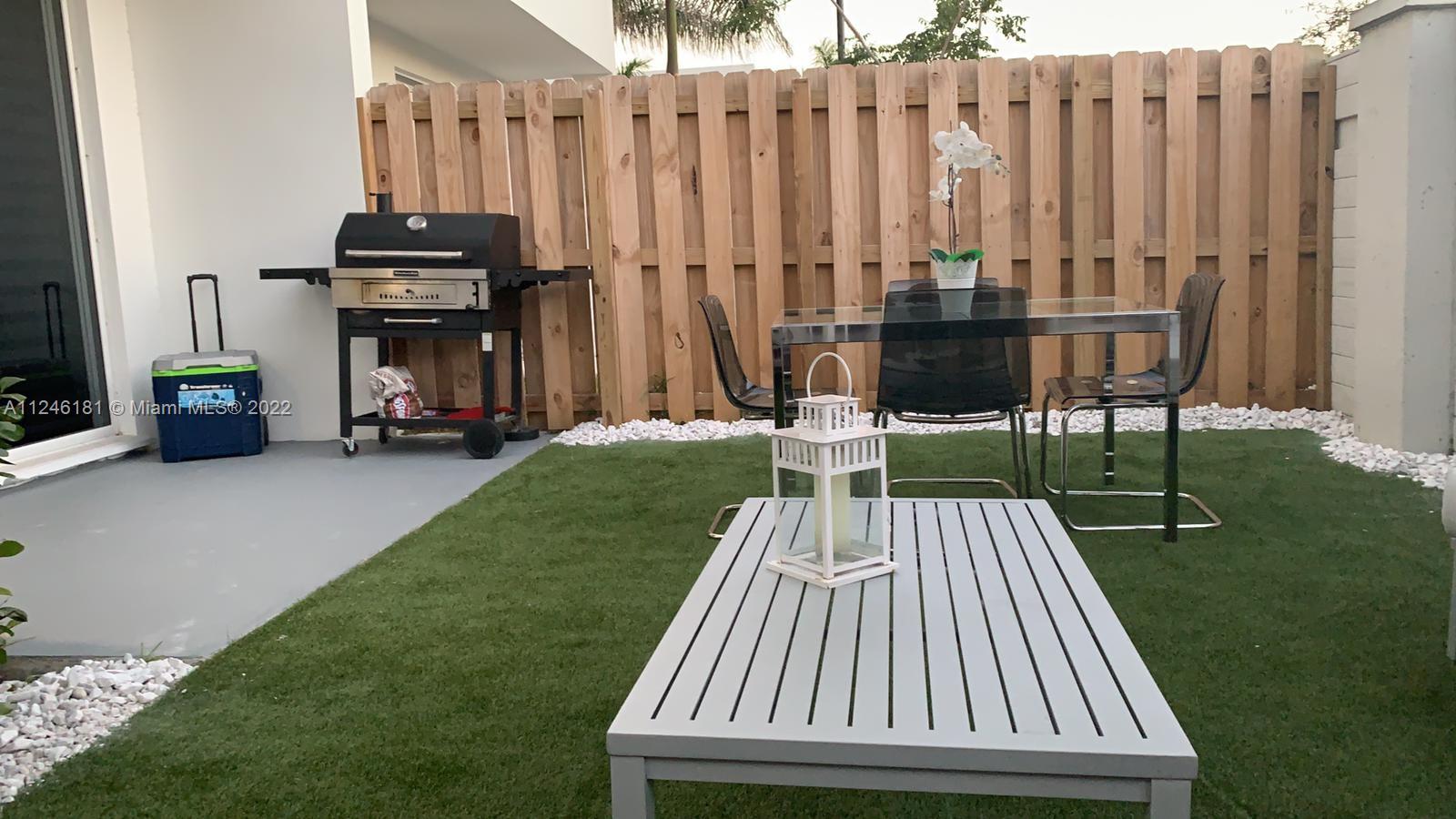 7220 Northwest 103rd Path Doral, FL 33178 - Photo 19 of 19 a view of outdoor space with seating