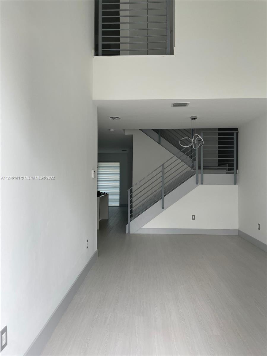 7220 Northwest 103rd Path Doral, FL 33178 - Photo 2 of 19 a view of an empty room