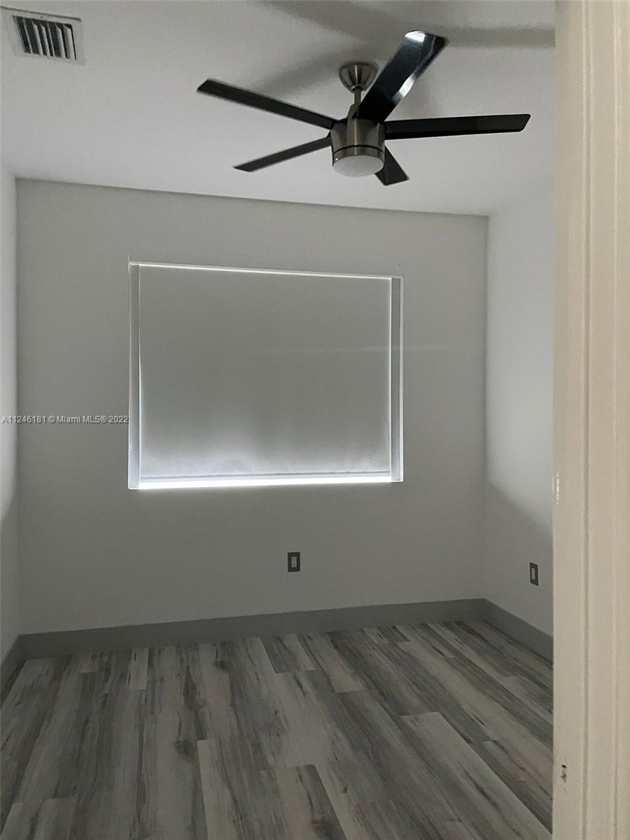 7220 Northwest 103rd Path Doral, FL 33178 - Photo 7 of 19 an empty room with a empty space