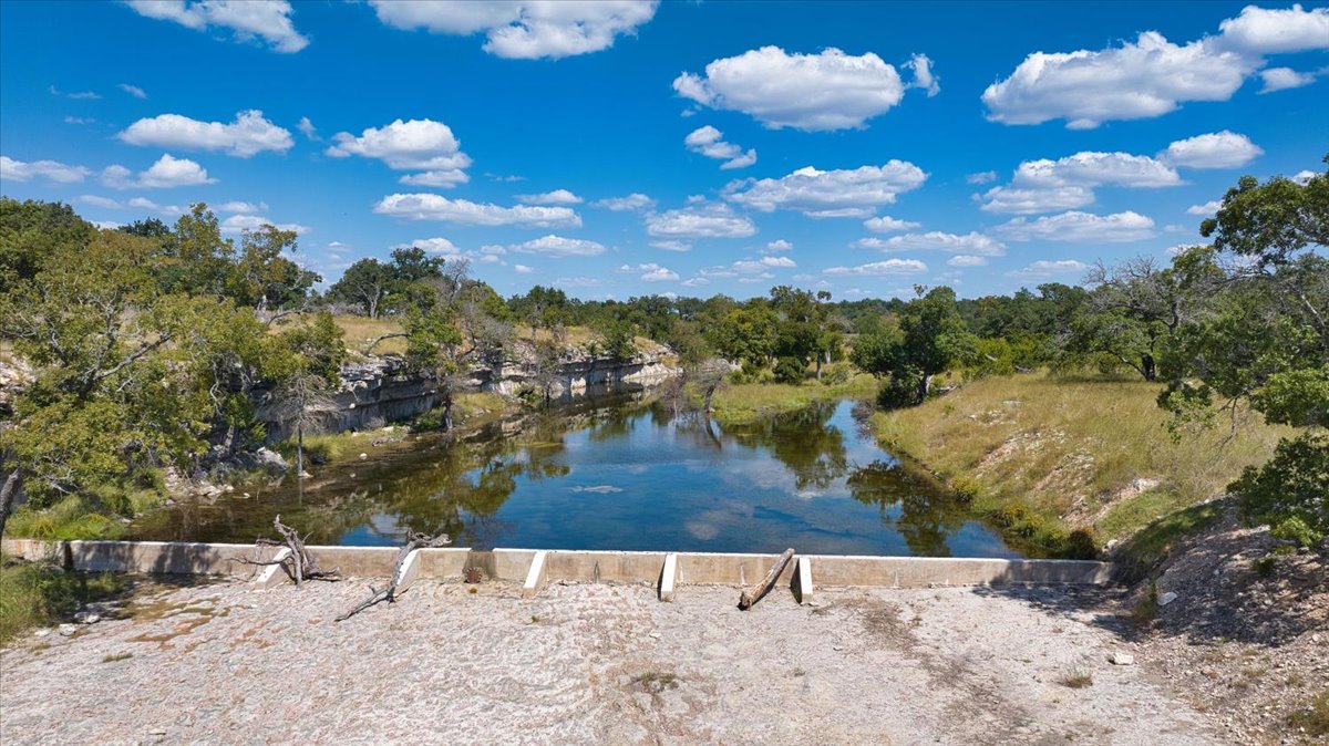 0 Confluence Drive Harper, TX 78631 - Photo 21 of 34 a view of a swimming pool with a yard