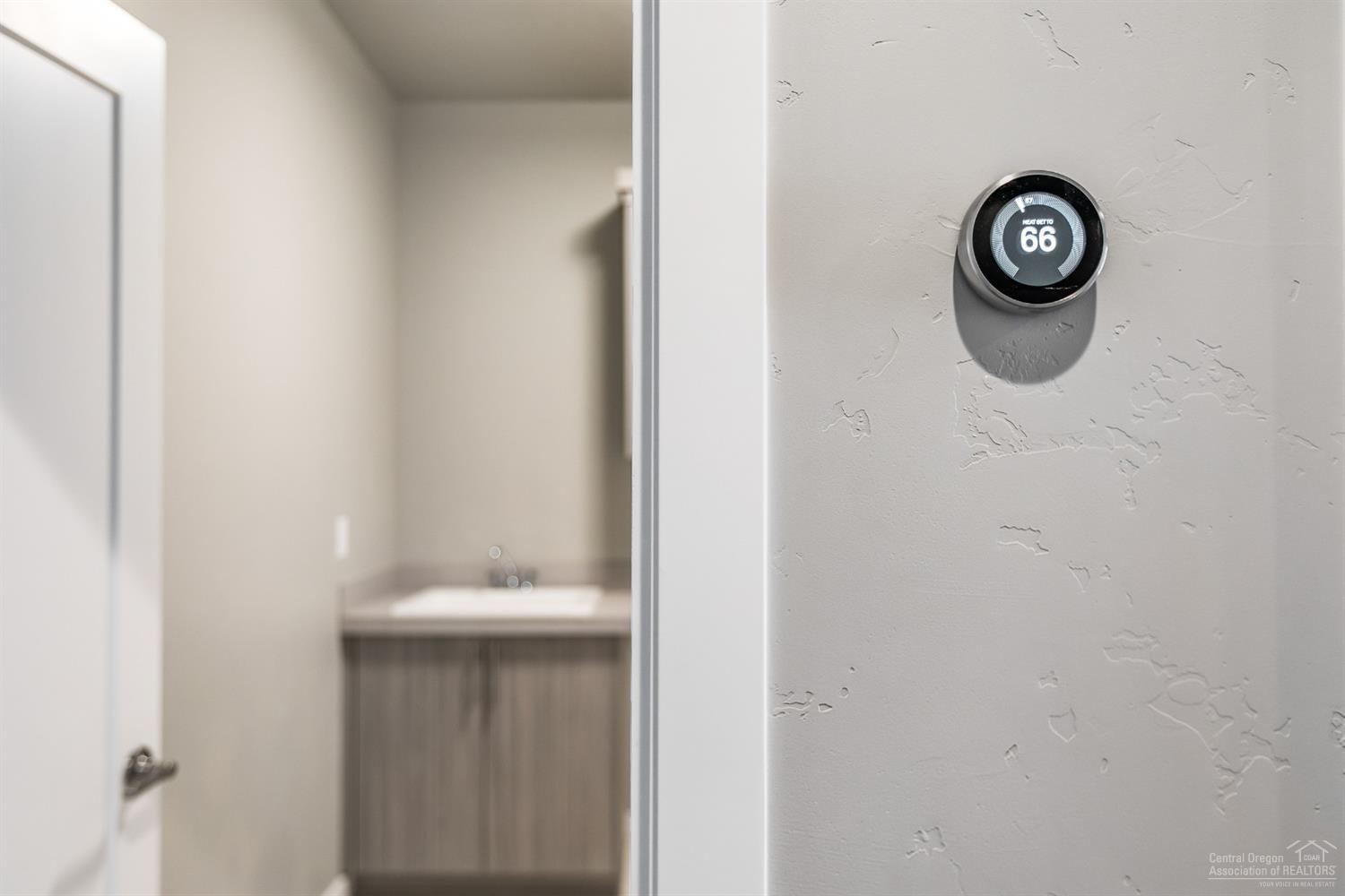 63120 Iner Loop Bend, OR 97701 - Photo 13 of 25 Nest Thermostat. Pictures are of a similar home.