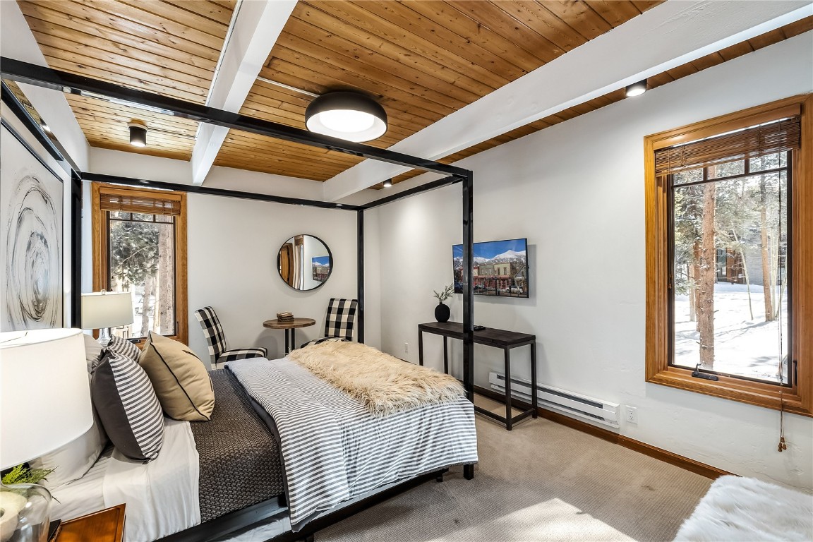 800 Columbine Road, Unit 5 Breckenridge, CO 80424 - Photo 21 of 38 a bedroom with bed and a window