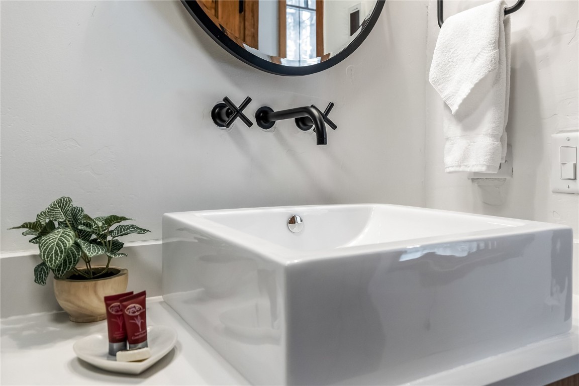 800 Columbine Road, Unit 5 Breckenridge, CO 80424 - Photo 25 of 38 a bathroom with a sink and a mirror