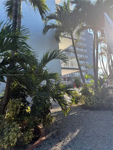 a view of swimming pool with a patio
