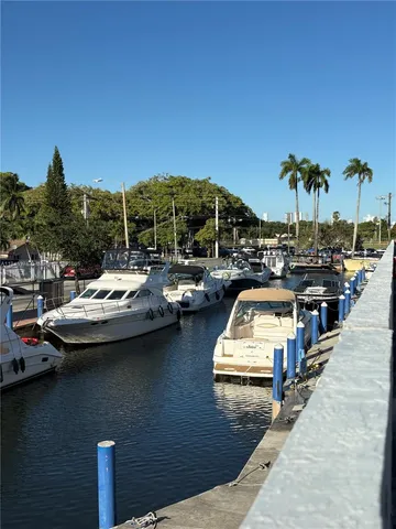 a view of a lake with a car parked