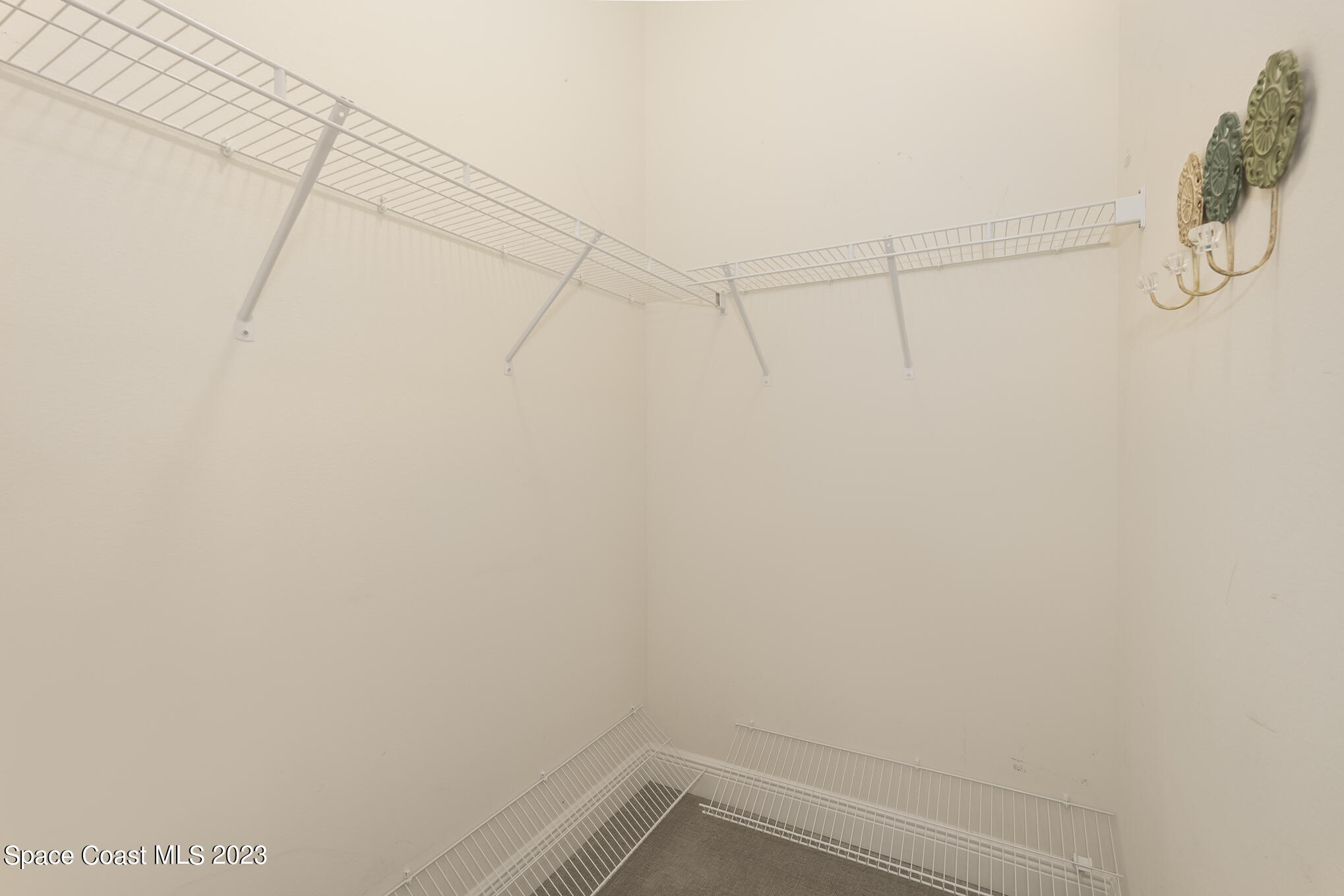 448 Lorelei Avenue Melbourne, FL 32901 - Photo 15 of 31 a view of a room with racks on the wall
