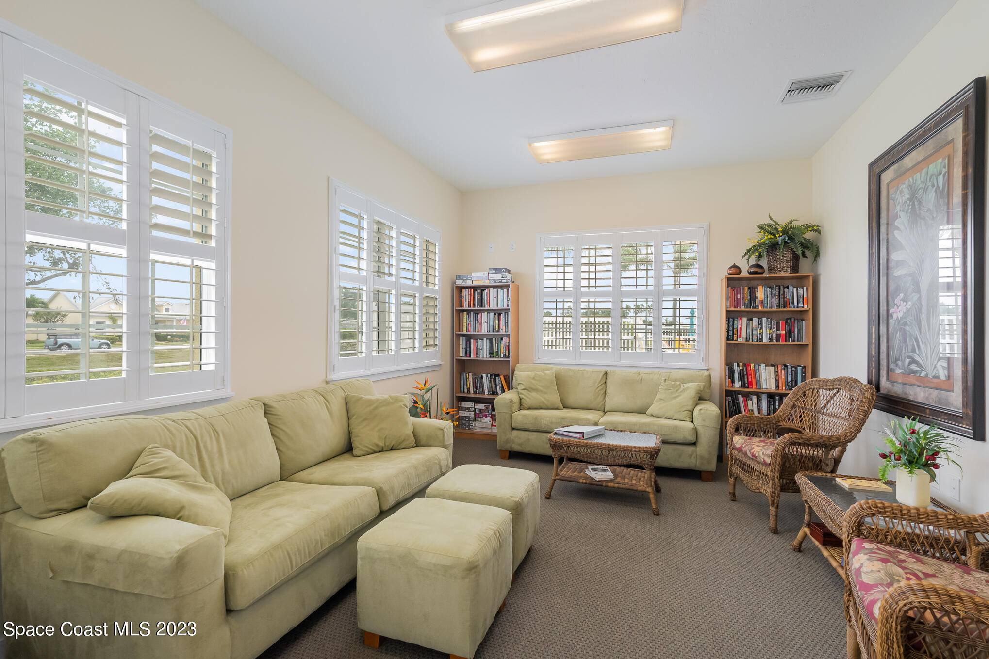 448 Lorelei Avenue Melbourne, FL 32901 - Photo 25 of 31 a living room with furniture and a large window