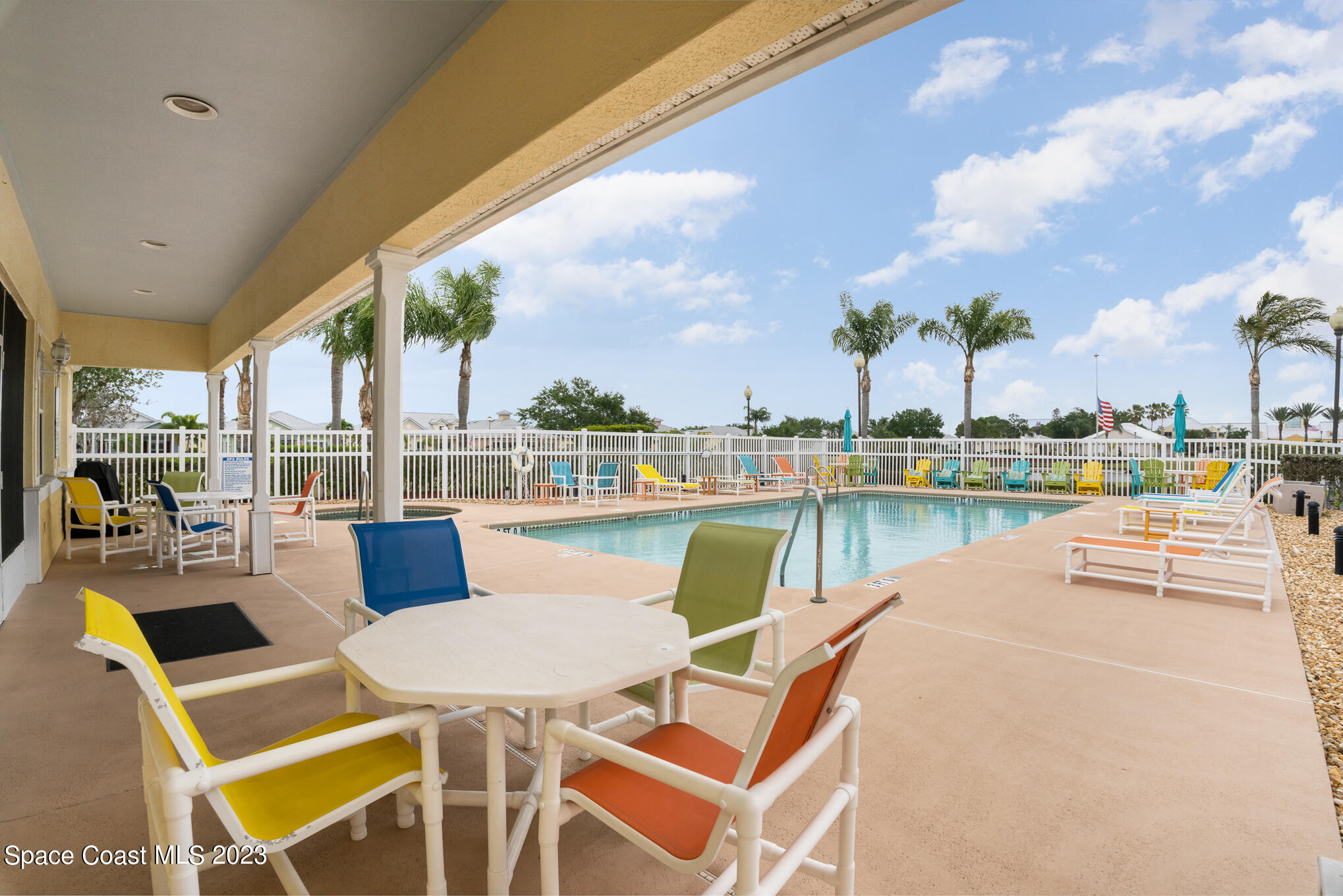 448 Lorelei Avenue Melbourne, FL 32901 - Photo 27 of 31 a view of swimming pool with outdoor seating and city view