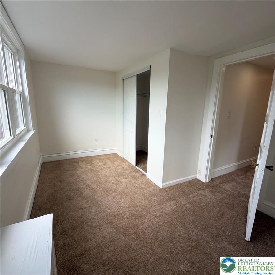 5111 Vera Cruz Road Emmaus, PA 18049 - Photo 36 of 44 Plush wall-to-wall carpeting and multiple windows create a comfortable and inviting atmosphere.