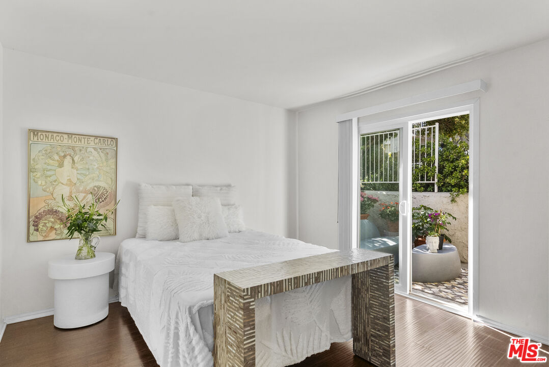 28366 Rey De Copas Lane Malibu, CA 90265 - Photo 11 of 20 a bedroom with a bed and a couch