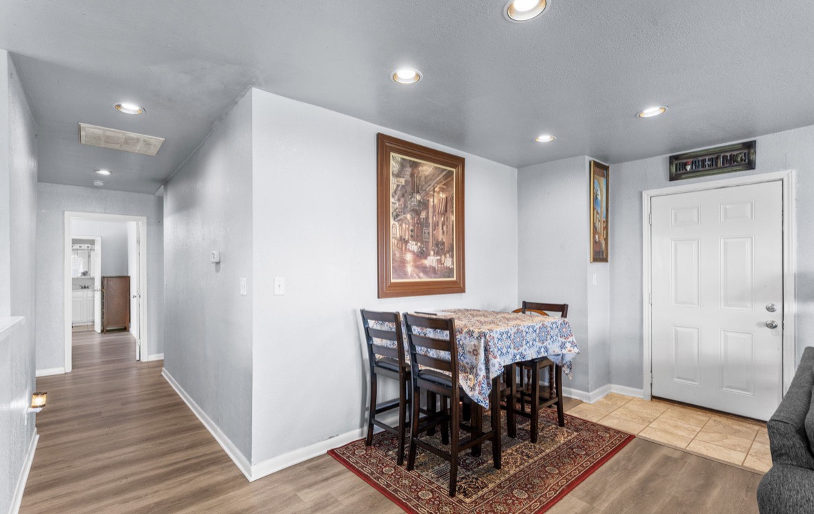 620 6th Street Dickinson, TX 77539 - Photo 20 of 36 a view of a dining room with furniture window and wooden floor