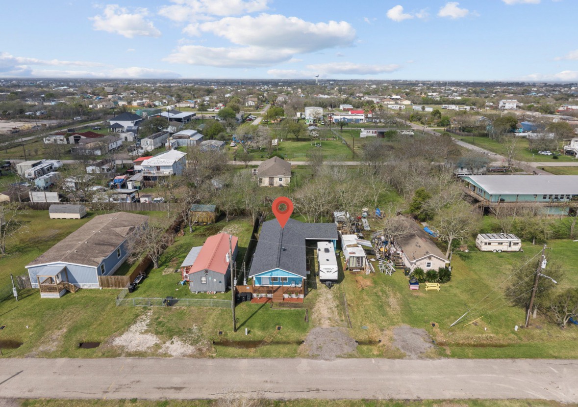 620 6th Street Dickinson, TX 77539 - Photo 33 of 36 an aerial view of residential houses with outdoor space