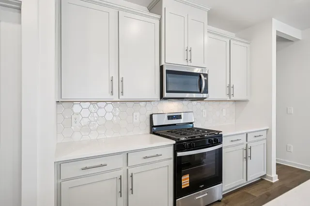 a view of kitchen and windows