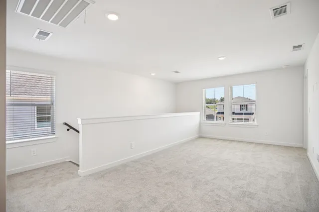 a view of a room with racks on the wall