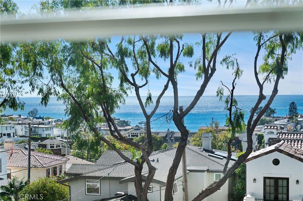 503 Hazel Drive Corona del Mar, CA 92625 - Photo 33 of 39 an ocean view with outdoor seating and trees