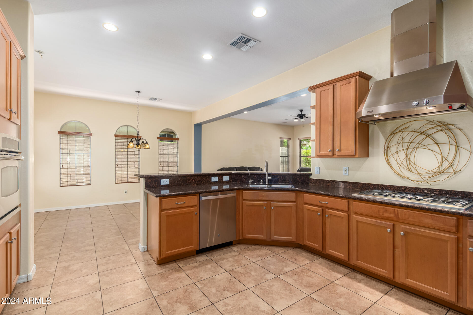 20438 West White Rock Road Buckeye, AZ 85396 - Photo 5 of 53 Gas Cooktop With Stainless Hood