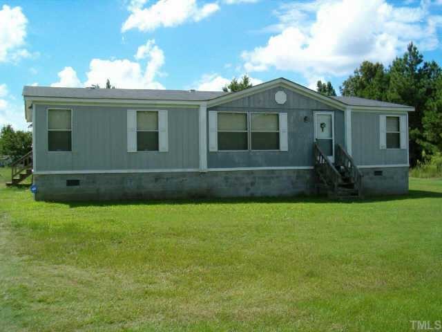 501 Foster Road Henderson, NC 27537 - Photo 1 of 1 front view of house with a yard