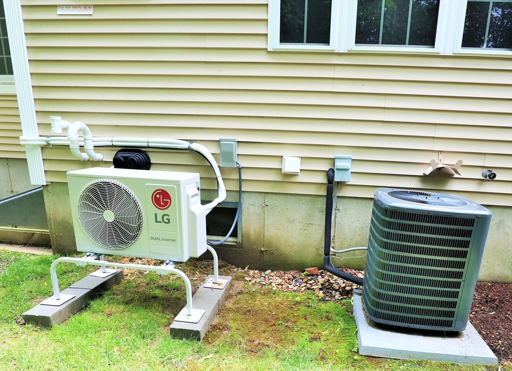 90 Central Street, Unit 2 East Bridgewater, MA 02333 - Photo 15 of 16 a bathroom with a sink and a mirror