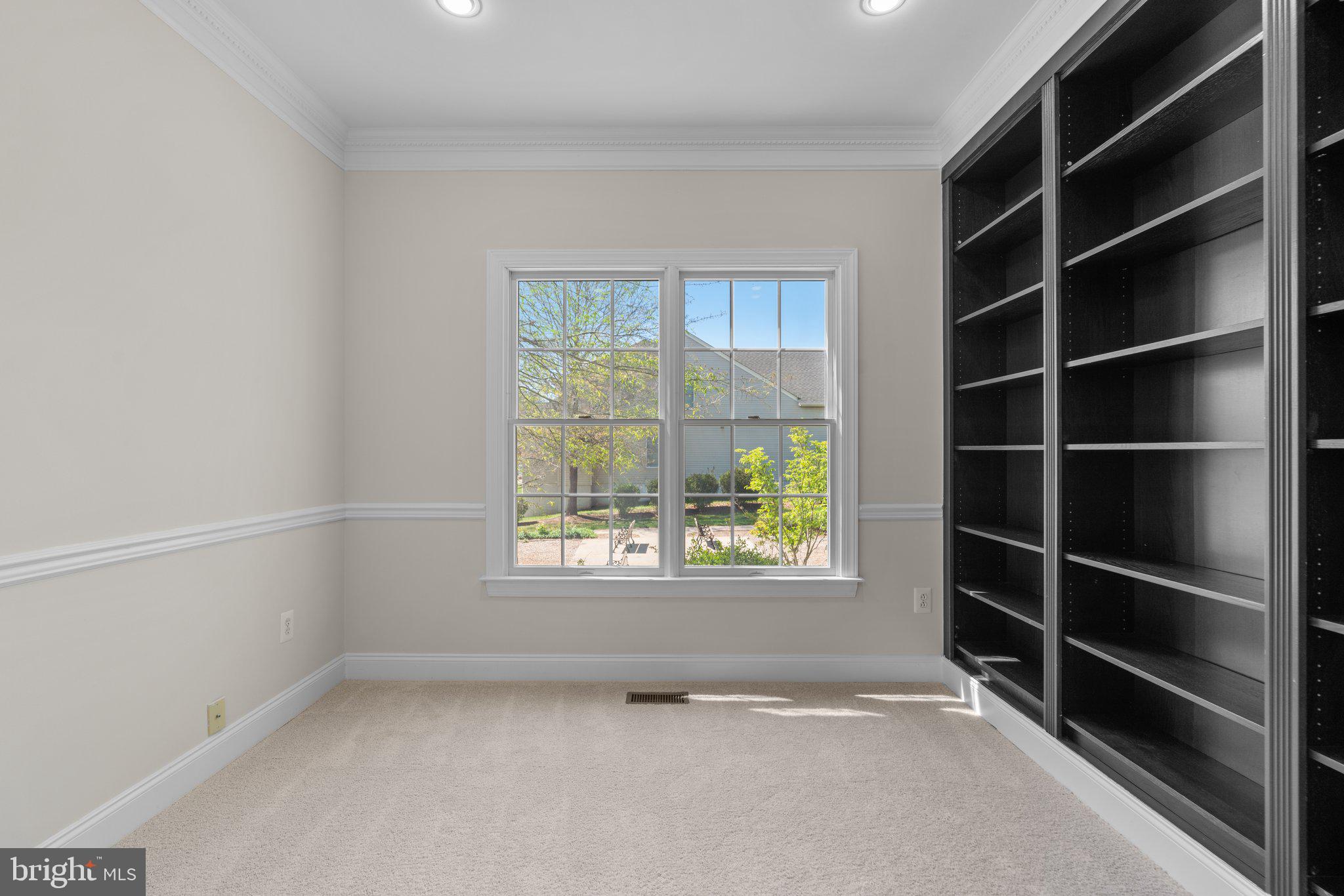 22104 Ginger Tree Way Clarksburg, MD 20871 - Photo 24 of 57 a view of an empty room with a window