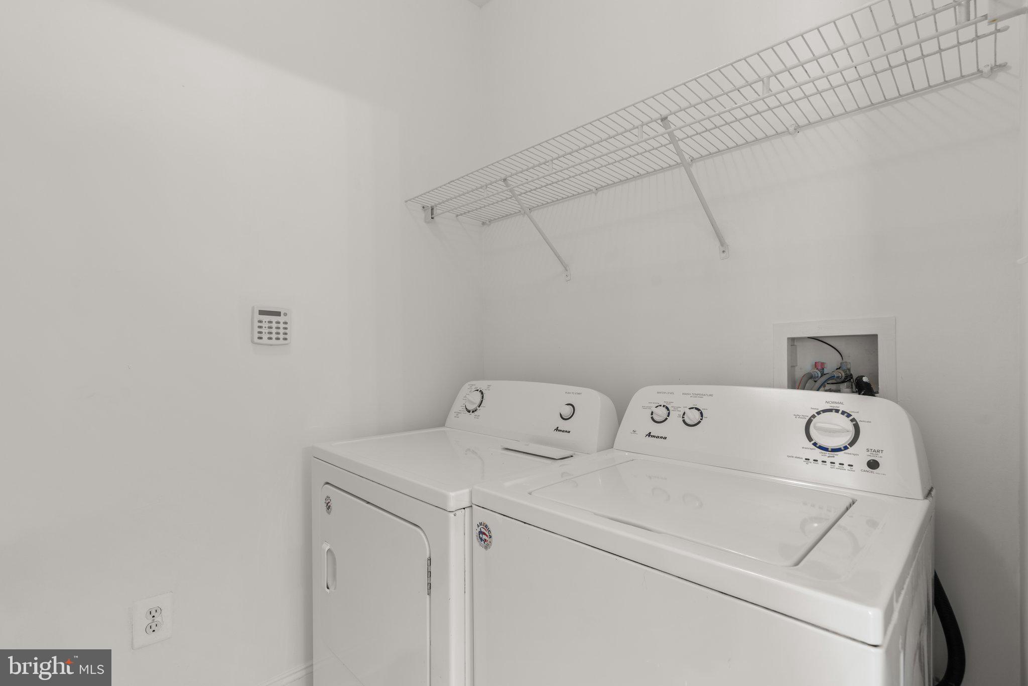 22104 Ginger Tree Way Clarksburg, MD 20871 - Photo 27 of 57 a utility room with dryer and washer